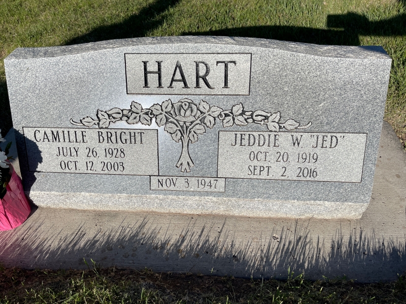 Grave marker for Jeddie Woodrow and Camille Bright Hart