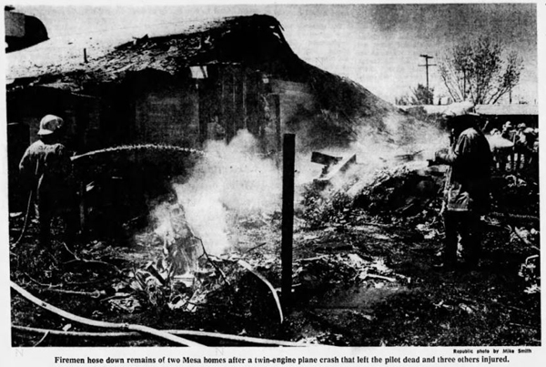 Firemen housing down burned homes on Lesuer Street